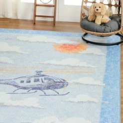 Discount 🎁 Miranda Haus World Traveler Helicopter Polyester Indoor Kids' Area Rug Cerulean Blue 🎉